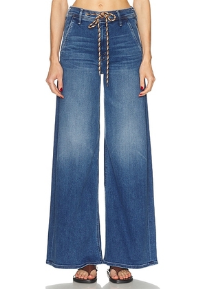 MOTHER The Drawn Undercover Prep Sneak Jeans in Fuzzy Wuzzy Was A Bear - Blue. Size 26 (also in 27, 28, 29, 30, 31, 32).