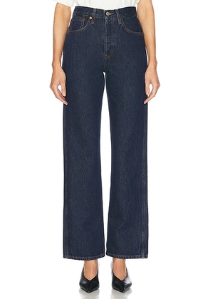 RE/DONE 90's High Rise Loose Jeans in Heritage Rinse - Denim-Dark. Size 23 (also in 24, 25, 26, 27, 30, 31).