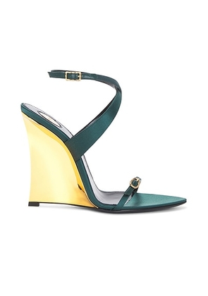 Saint Laurent Gippy Wedge Sandal in Glass Bottle Green - Dark Green. Size 36.5 (also in 36, 37, 37.5, 38, 38.5, 39, 39.5, 40, 41).