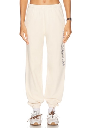 Sporty & Rich Health & Wellness Crest Sweatpant in Cream - Cream. Size S (also in ).