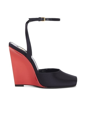 Saint Laurent La Scandale Wedge Sandal in Patriot Navy - Navy. Size 36.5 (also in 36, 37, 38, 38.5, 39, 39.5, 40, 41).