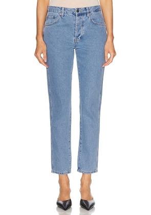 RENGGLI Slim Leg Jeans in Light Wash in Light Indigo - Blue. Size 26 (also in 25, 27, 28, 29, 30, 31, 32, 33, 34).