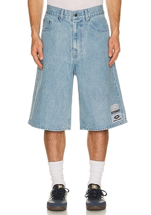 Siegelman Stable x Ford Patched Denim Jorts in Blue Indigo - Blue. Size 32 (also in 30, 34, 36, 38).