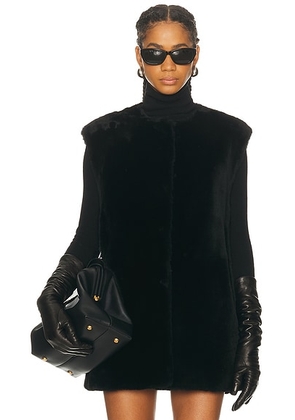 Toteme Plush Shearling Vest in Black - Black. Size 36 (also in 32, 38).