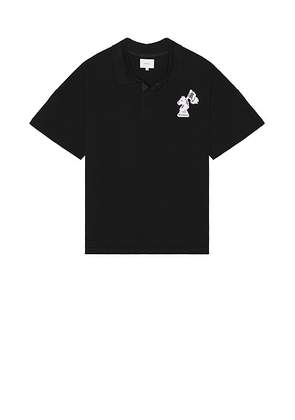 Rhude Pique Boxy Polo Shirt in Black & White - Black. Size M (also in L, S, XXL/2X).
