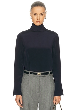 RENGGLI Silk Turtleneck Top in Midnight - Navy. Size M (also in L, S, XL, XS).