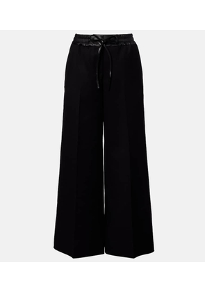 Alaia Leather-trimmed virgin wool wide-leg pants