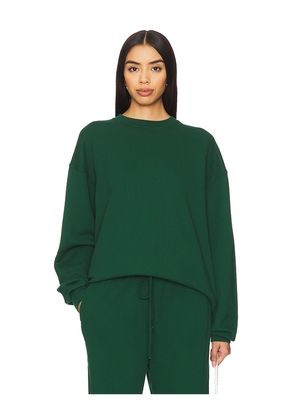 DONNI. x REVOLVE Eco Fleece Crewneck Sweatshirt in Green. Size XS. Also in S.
