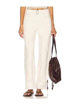 AGOLDE Cuffed Taper Jeans in Ivory. Size 25. Also in 24, 26, 27, 28, 29, 32, 33.