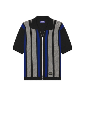 Deva States Junior Zip Knitted Polo in Black. Size S. Also in M.