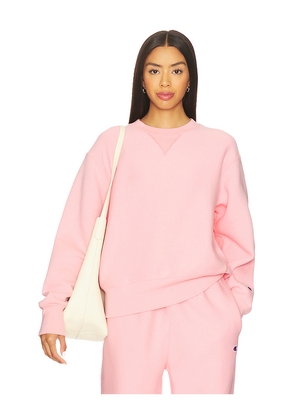 Champion Essentials Reverse Weave Crew Neck Sweatshirt in Pink. Size M. Also in S, XS, L, XL.