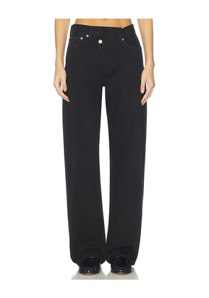 AGOLDE Arc Criss Cross Jeans in Black. Size 24. Also in 23, 25, 26, 27, 28, 29, 30, 32, 33.