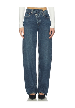 AGOLDE Arc Criss Cross Jeans in Blue. Size 24. Also in 25, 26, 27, 28, 32, 33, 34.
