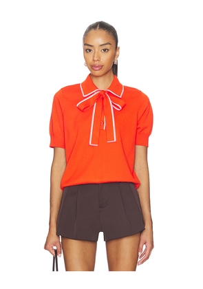 Essentiel Antwerp Jojoba Polo With Bow in Orange. Size S. Also in XS, M, XL.