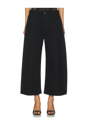 THE ATTICO Curved Short Leg in Black. Size 28. Also in 25, 26, 30.