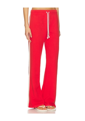 DAYDREAMER Solid Track Pant in Red. Size M. Also in L, S.