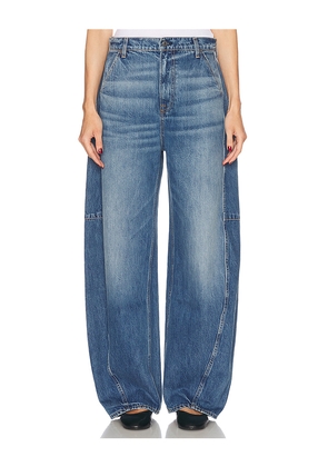 GRLFRND Harvey Twisted Carpenter Jeans in Blue. Size 24. Also in 25.