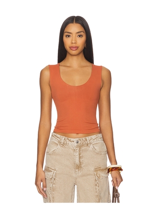 Free People x Intimately FP Clean Lines Muscle Cami In Cinnamon Stick in Orange. Size M/L. Also in L/XL, XS/S.