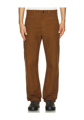 Filson Dry Tin Double Front Pants in Brown. Size 30x34. Also in 30x32, 32x32, 36x32, 34x32.
