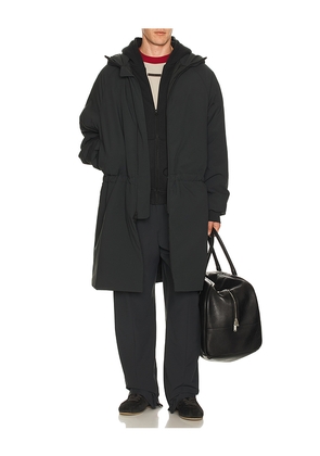 Fear of God ESSENTIALS Hooded Parka in Black. Size M. Also in L, XL/1X.