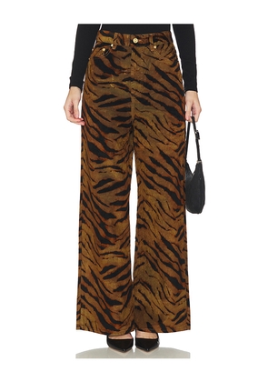 Ganni Printed Flock Denim Baggy in Tan. Size 26. Also in 25, 27.