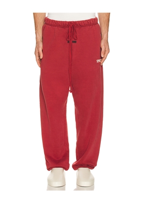 Fear of God ESSENTIALS Classic Sweatpant in Red. Size M. Also in L, S, XL/1X, XS.
