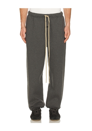 Fear of God ESSENTIALS Classic Sweatpant in Black. Size M. Also in L, XL/1X, XXL/2X.