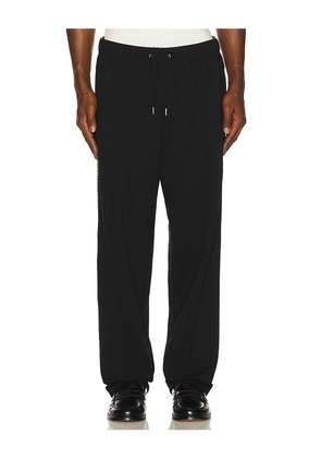 Fred Perry Cross Tape Track Pant in Black. Size M. Also in S, L, XL/1X.