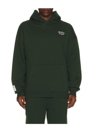 Huega House Icon Hoodie in Green. Size M. Also in S.
