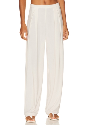 Norma Kamali Tapered Pleated Trouser in Cream. Size M. Also in XS, S.