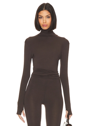 Norma Kamali Slim Fit Long Sleeve Turtle Top in Chocolate. Size M. Also in XXS, XS, S, L, XL.