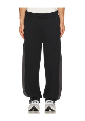 On x Ikon Track Pants in Black. Size L. Also in S, XL/1X.