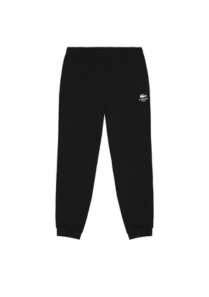 Lacoste Tapered Fit Sweatpants in Black. Size S. Also in XL/1X.