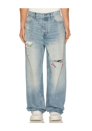 Nahmias Friendship Baggy Jeans in Blue. Size 34. Also in 30, 36.