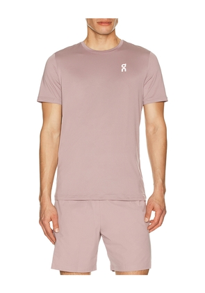 On Core-T in Mauve. Size M. Also in L, XL/1X, S.
