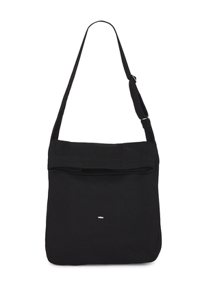Our Legacy Sling Bag in Black.