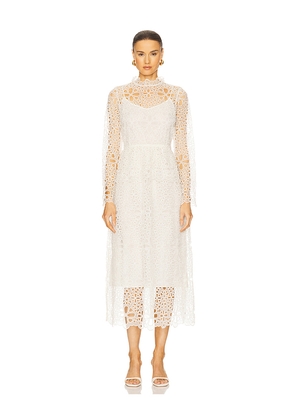 Sea Lumi Eyelet Peplum Long Sleeve Dress in White. Size 00. Also in 2, 0, 4, 10.