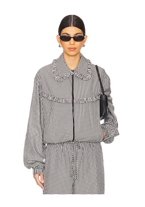 Tanner Fletcher Archie Ruffle Trim Track Jacket in Black,White. Size 3/L. Also in 0/XS.