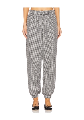 Tanner Fletcher Kennedy Ruffle Gingham Track Pant in Black. Size 1/S. Also in 0/XS, 3/L.