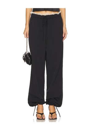 Tanner Fletcher Kennedy Lace Trim Track Pant in Black. Size 1/S. Also in 0/XS, 3/L.