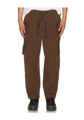 Students Golf Wilcox Nylon Pants in Brown. Size M. Also in S, L, XL/1X.