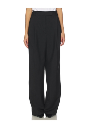 Rohe Mid-Waist Tailored Trousers in Black. Size 34. Also in 36, 38.