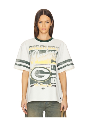 The Wild Collective Packers Drop Shoulder Vintage Tee in Cream. Size M. Also in XS, S.