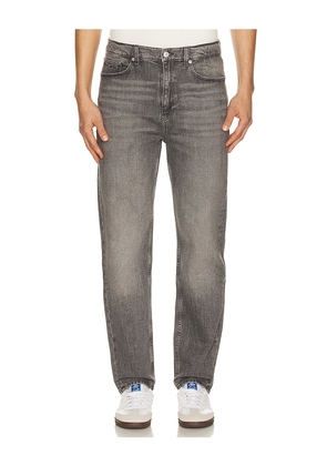 Tommy Jeans Sonny Regular Tapered Jeans in Black. Size 32. Also in 31, 33, 34, 36.