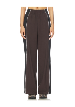 ROTATE Crispy Woven Pant in Brown. Size 34. Also in 38, 40.