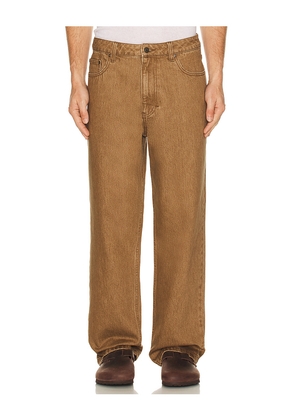 Rhythm Subtle Baggy Jean in Brown. Size 34. Also in 30, 36.