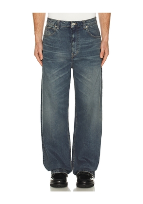 Tommy Jeans Theo Baggy in Blue. Size 31. Also in 30, 32, 33.