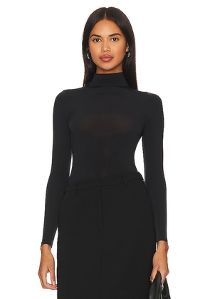 Wolford Buenos Aires String Body in Black. Size L. Also in S.