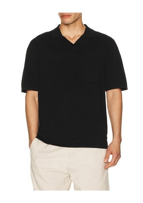 Rhythm Textured Knit Johnny Polo in Black. Size L. Also in M, S, XL/1X.