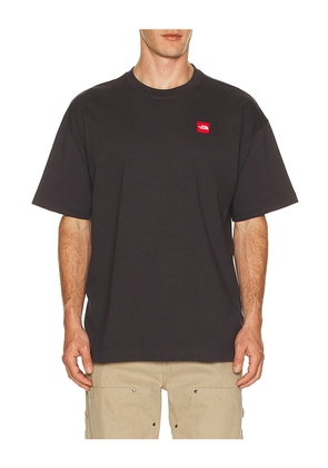 The North Face Red Box Short Sleeve Tee in Black. Size L. Also in M, S, XL/1X, XXL/2X.